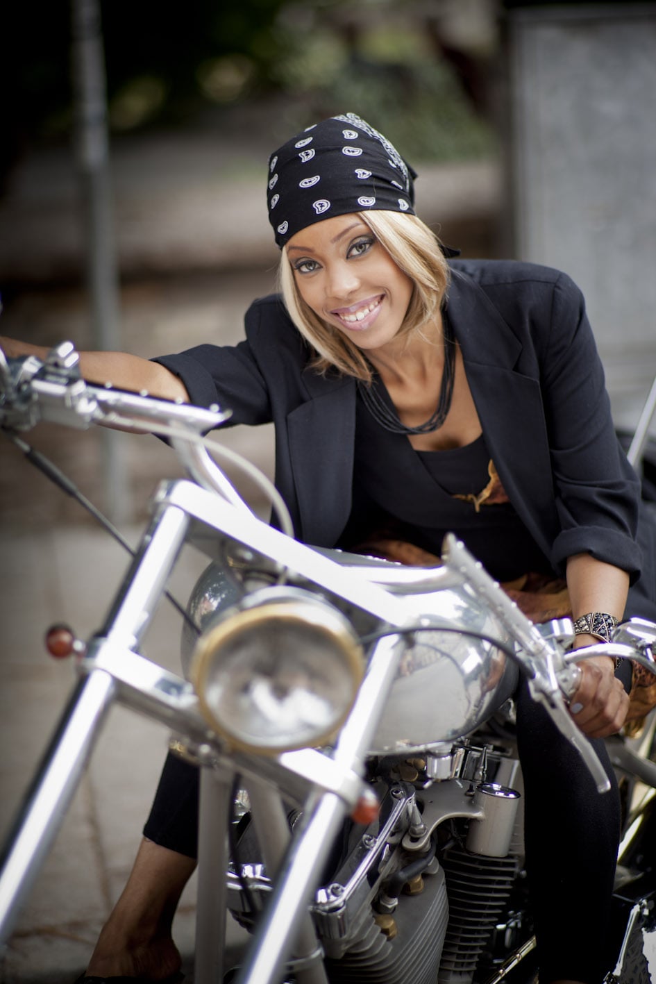 Kiralina on motorcycle with bandana